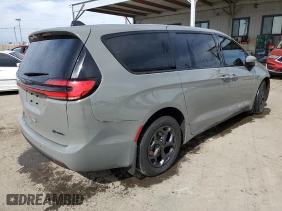 ✅ 2023 Chrysler Pacifica Hybrid Touring L • VIN: 2C4RC1L75PR580133 • Lot: 56873655. Listed on Copart with 31,718 mi. Free auction sales archive from the USA and detailed vehicle history report at DreamBid. Image 3.