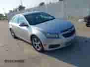 2014 Chevrolet Cruze 2LT with VIN 1G1PE5SB1E7372384, listed as a IAAI auction lot 43048716 with 153,863 mi miles and . Bid and sale history available at DreamBid. Image 1.