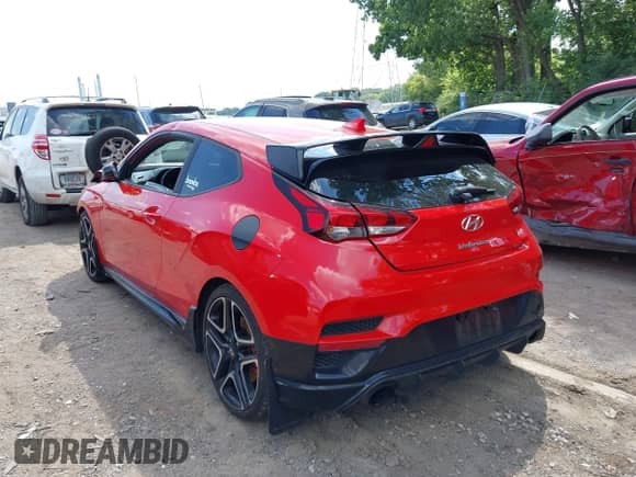 2020 Hyundai Veloster z VIN KMHT36AH0LU004909, wystawiony jako IAAI lot #42657127 z przebiegiem 86 557 mil mil oraz . Historia ofert i sprzedaży dostępna na DreamBid. Obrazek 3.