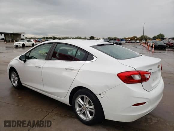 2017 Chevrolet Cruze LT z VIN 1G1BE5SM6H7167689, wystawiony jako Copart lot #66031372 z przebiegiem 143 755 mil mil oraz . Historia ofert i sprzedaży dostępna na DreamBid. Obrazek 2.