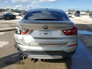 ✅ 2015 BMW X4 xDrive28i • VIN: 5UXXW3C50F0M88914 • Lot: 89833905. Wystawiony na Copart z przebiegiem 87 775 mil. Bezpłatny archiwum sprzedaży aukcyjnych z USA i szczegółowy raport historii pojazdu na DreamBid. Zdjęcie 6.