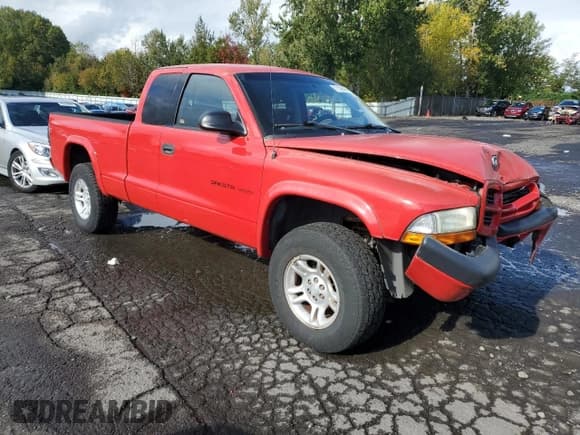 ✅ 2002 Dodge Dakota Sport • VIN: 1B7GG32N22S510037 • Lot: 77149424. Wystawiony na Copart z przebiegiem 91 256 mil. Bezpłatny archiwum sprzedaży aukcyjnych z USA i szczegółowy raport historii pojazdu na DreamBid. Zdjęcie 4.