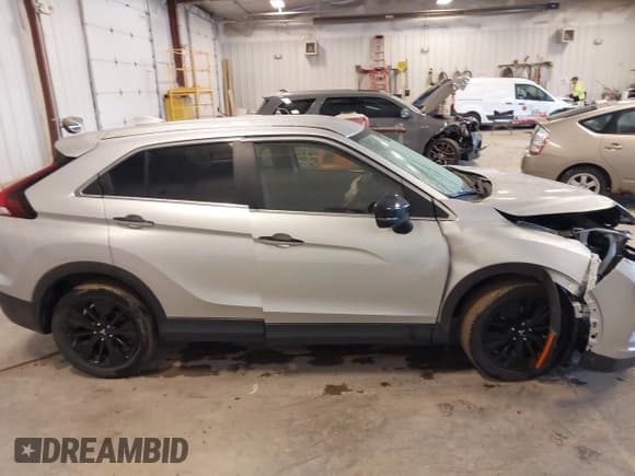 ✅ 2022 Mitsubishi Eclipse Cross LE • VIN: JA4ASVAA7NZ054234 • Лот: 42325344. Опубликован ранее на IAAI с пробегом 36 118 миль. Бесплатный доступ к архиву аукционных продаж из США и подробный отчёт об истории автомобиля на DreamBid. Изображение 12.