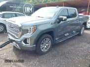 ✅ 2021 GMC Sierra 1500 Denali • VIN: 3GTP8FED4MG219499 • Lot: 42766910. Listed on IAAI with 107,401 mi. Free auction sales archive from the USA and detailed vehicle history report at DreamBid. Image 2.