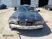 2000 BMW 3 Series 323Ci z VIN WBABM334XYJN62925, wystawiony jako Copart lot #57619495 z przebiegiem 139 843 mil mil oraz Szkoda całkowita • Salvage title. Historia ofert i sprzedaży dostępna na DreamBid. Obrazek 5.