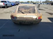 ✅ 1979 Porsche 928 • VIN: 9289201367 • Lot: 91893835. Wystawiony na Copart z przebiegiem 135 001 mil. Bezpłatny archiwum sprzedaży aukcyjnych z USA i szczegółowy raport historii pojazdu na DreamBid. Zdjęcie 6.