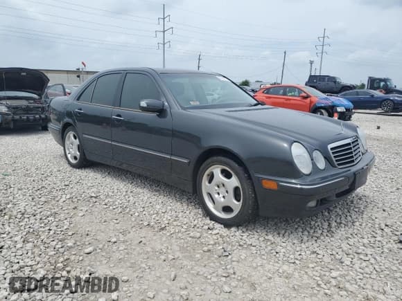 ✅ 2001 Mercedes-Benz E 320 • VIN: WDBJF70JX1B351944 • Lot: 63948705. Listed on Copart with 141,504 mi. Free auction sales archive from the USA and detailed vehicle history report at DreamBid. Image 4.