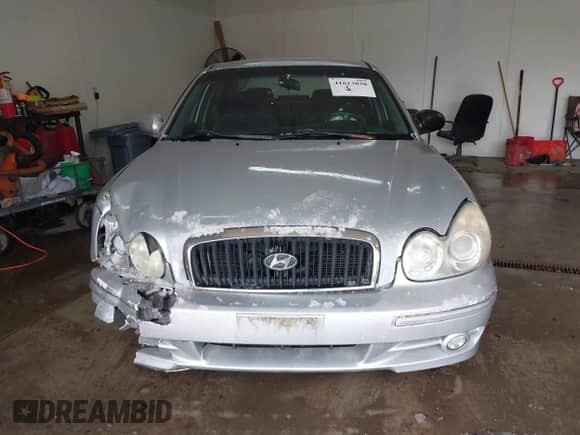 2002 Hyundai Sonata z VIN KMHWF25S42A574561, wystawiony jako IAAI lot #41613838 z przebiegiem 141 808 mil mil oraz . Historia ofert i sprzedaży dostępna na DreamBid. Obrazek 13.