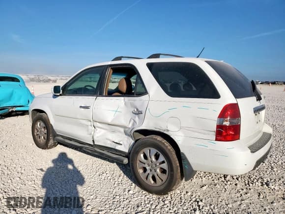 ✅ 2003 Acura MDX Touring • VIN: 2HNYD18693H527700 • Lot: 84438275. Wystawiony na Copart z przebiegiem 274 349 mil. Bezpłatny archiwum sprzedaży aukcyjnych z USA i szczegółowy raport historii pojazdu na DreamBid. Zdjęcie 2.