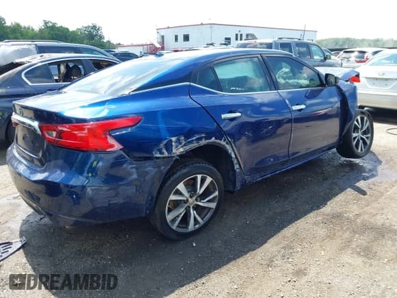 ✅ 2016 Nissan Maxima SR • VIN: 1N4AA6AP2GC431292 • Lot: 42355545. Listed on IAAI with 153,900 mi. Free auction sales archive from the USA and detailed vehicle history report at DreamBid. Image 4.