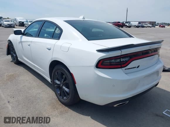 ✅ 2023 Dodge Charger SXT • VIN: 2C3CDXJG2PH706094 • Лот: 43162048. Опубликован ранее на IAAI с пробегом 61 307 миль. Бесплатный доступ к архиву аукционных продаж из США и подробный отчёт об истории автомобиля на DreamBid. Изображение 3.