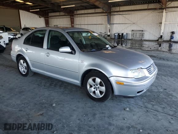 ✅ 2003 Volkswagen Jetta GLS • VIN: 3VWSP69M53M072355 • Lot: 87067915. Listed on Copart with 156,496 mi. Free auction sales archive from the USA and detailed vehicle history report at DreamBid. Image 4.