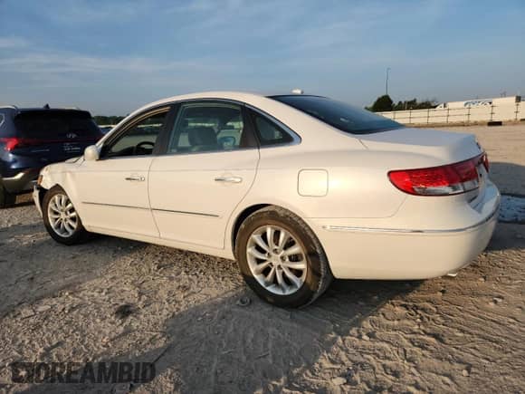 2007 Hyundai Azera SE с VIN KMHFC46F47A203140, выставлен на аукционе Copart как лот 62090625 с пробегом 65 407 миль миль и Списание • Salvage title. История ставок и продаж доступна на DreamBid. Изображение 2.