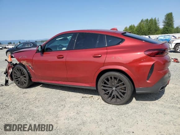 ✅ 2023 BMW X6 M50i • VIN: 5UXCY8C00P9R56499 • Лот: 61268025. Опубликован ранее на Copart с пробегом Не указан. Бесплатный доступ к архиву аукционных продаж из США и подробный отчёт об истории автомобиля на DreamBid. Изображение 2.