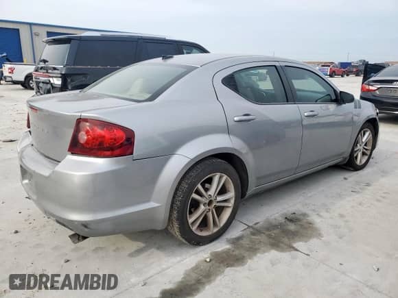 2013 Dodge Avenger SE with VIN 1C3CDZAB8DN666946, listed as a Copart auction lot 70590785 with 173,172 mi miles and Salvage title. Bid and sale history available at DreamBid. Image 3.