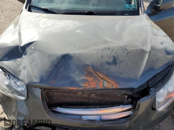 ✅ 2012 Hyundai Santa Fe Limited • VIN: 5XYZKDAG1CG109912 • Lot: 78305644. Listed on Copart with 133,990 mi. Free auction sales archive from the USA and detailed vehicle history report at DreamBid. Image 14.