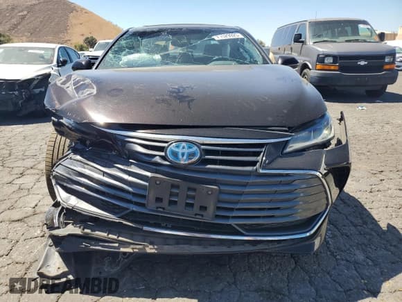 ✅ 2020 Toyota Avalon Limited Hybrid • VIN: 4T1C21FB9LU012940 • Lot: 71529925. Listed on Copart with 142,258 mi. Free auction sales archive from the USA and detailed vehicle history report at DreamBid. Image 5.