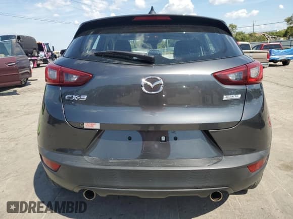 ✅ 2018 Mazda CX-3 Sport • VIN: JM1DKDB74J0331517 • Лот: 81597285. Опубликован ранее на Copart с пробегом 28 641 миль. Бесплатный доступ к архиву аукционных продаж из США и подробный отчёт об истории автомобиля на DreamBid. Изображение 6.
