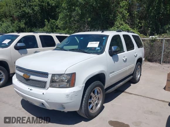 ✅ 2014 Chevrolet Tahoe LT • VIN: 1GNSCBE03ER213054 • Lot: 42821489. Listed on IAAI with 166,689 mi. Free auction sales archive from the USA and detailed vehicle history report at DreamBid. Image 18.