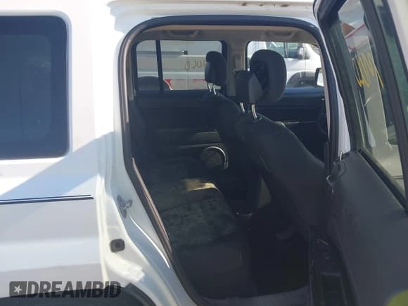 ✅ 2014 Jeep Patriot Sport • VIN: 1C4NJRBB3ED623859 • Lot: 42985665. Listed on IAAI with 127,764 mi. Free auction sales archive from the USA and detailed vehicle history report at DreamBid. Image 8.