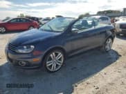 ✅ 2012 Volkswagen Eos Lux • VIN: WVWFW7AH2CV003172 • Lot: 70284125. Listed on Copart with 63,593 mi. Free auction sales archive from the USA and detailed vehicle history report at DreamBid. Image 1.