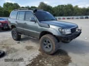 ✅ 1999 Toyota Land Cruiser • VIN: JT3HT05J2X0032345 • Lot: 84022835. Wystawiony na Copart z przebiegiem 261 049 mil. Bezpłatny archiwum sprzedaży aukcyjnych z USA i szczegółowy raport historii pojazdu na DreamBid. Zdjęcie 4.