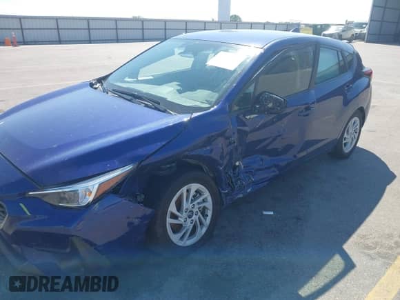 2024 Subaru Impreza with VIN JF1GUABC5R8854700, listed as a IAAI auction lot 43123622 with 10,623 mi miles and . Bid and sale history available at DreamBid. Image 6.