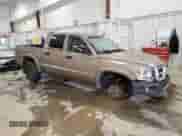 2010 Dodge Dakota SXT z VIN 1D7CW3GP2AS104212, wystawiony jako Copart lot #44062435 z przebiegiem 203 233 mil mil oraz Czysty tytuł • Clean title. Historia ofert i sprzedaży dostępna na DreamBid. Obrazek 4.