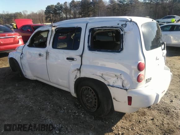 ✅ 2011 Chevrolet HHR LS • VIN: 3GNBAAFW1BS647906 • Lot: 41421828. Listed on IAAI with 242,596 mi. Free auction sales archive from the USA and detailed vehicle history report at DreamBid. Image 18.
