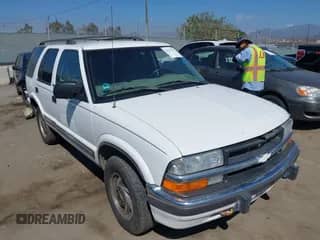 1999 Chevrolet Blazer LS with VIN 1GNDT13W0X2176809, listed as a IAAI auction lot 43311943 with 124,071 mi miles and . Bid and sale history available at DreamBid. Image 1.