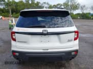 ✅ 2019 Honda Passport Elite • VIN: 5FNYF8H03KB023989 • Lot: 43823344. Listed on IAAI with Not provided. Free auction sales archive from the USA and detailed vehicle history report at DreamBid. Image 16.