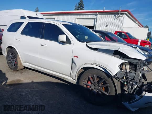 2018 Dodge Durango SRT with VIN 1C4SDJGJ3JC395759, listed as a IAAI auction lot 41689356 with 83,577 mi miles and . Bid and sale history available at DreamBid. Image 1.