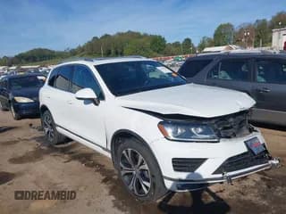 ✅ 2017 Volkswagen Touareg Wolfsburg Edition • VIN: WVGRF7BP7HD001784 • Лот: 43358059. Опубликован ранее на IAAI с пробегом 87 962 миль. Бесплатный доступ к архиву аукционных продаж из США и подробный отчёт об истории автомобиля на DreamBid. Изображение 1.