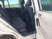 ✅ 2013 Volkswagen Tiguan S • VIN: WVGAV7AX3DW548857 • Lot: 43898093. Listed on IAAI with 122,204 mi. Free auction sales archive from the USA and detailed vehicle history report at DreamBid. Image 8.