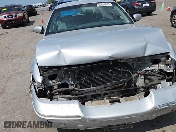 ✅ 2002 Mercury Grand Marquis GS • VIN: 2MEFM74W42X631407 • Lot: 66869645. Wystawiony na Copart z przebiegiem 104 779 mil. Bezpłatny archiwum sprzedaży aukcyjnych z USA i szczegółowy raport historii pojazdu na DreamBid. Zdjęcie 13.