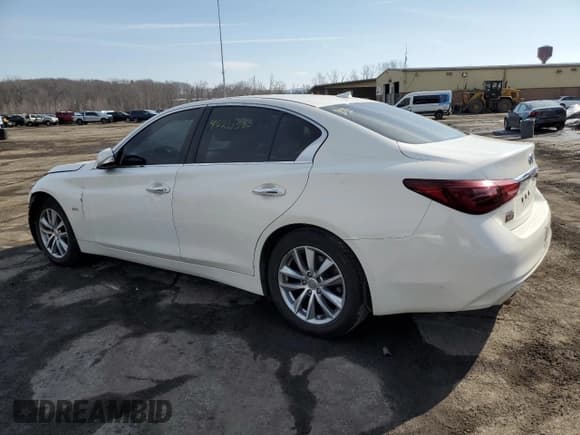 ✅ 2019 Infiniti Q50 Pure • VIN: JN1CV7AR8KM350026 • Лот: 46221555. Опубликован ранее на Copart с пробегом 78 122 миль. Бесплатный доступ к архиву аукционных продаж из США и подробный отчёт об истории автомобиля на DreamBid. Изображение 2.