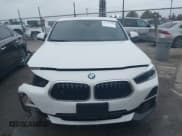 ✅ 2022 BMW X2 sDrive28i • VIN: WBXYH9C0XN5U31955 • Lot: 43793790. Listed on IAAI with 86,977 mi. Free auction sales archive from the USA and detailed vehicle history report at DreamBid. Image 13.