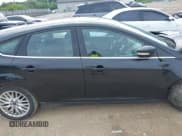 ✅ 2014 Ford Focus Titanium • VIN: 1FADP3N25EL194433 • Lot: 42512912. Listed on IAAI with 105,355 mi. Free auction sales archive from the USA and detailed vehicle history report at DreamBid. Image 13.