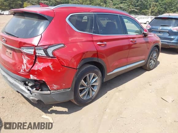 2019 Hyundai Santa Fe Ultimate z VIN 5NMS53AD2KH006415, wystawiony jako IAAI lot #43223455 z przebiegiem 89 574 mil mil oraz . Historia ofert i sprzedaży dostępna na DreamBid. Obrazek 4.