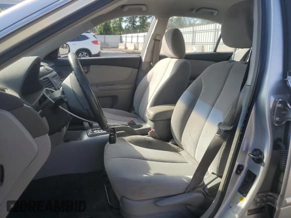 ✅ 2007 Kia Optima LX • VIN: KNAGE124175122110 • Lot: 71116625. Wystawiony na Copart z przebiegiem 164 671 mil. Bezpłatny archiwum sprzedaży aukcyjnych z USA i szczegółowy raport historii pojazdu na DreamBid. Zdjęcie 7.