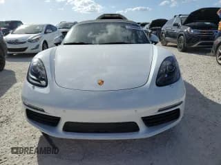 ✅ 2023 Porsche Boxster • VIN: WP0CA2A88PS205171 • Лот: 77089964. Опубликован ранее на Copart с пробегом Не указан. Бесплатный доступ к архиву аукционных продаж из США и подробный отчёт об истории автомобиля на DreamBid. Изображение 5.