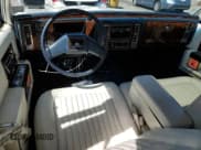 ✅ 1990 Cadillac Brougham • VIN: 1G6DW5479LR709291 • Лот: 50173935. Опубликован ранее на Copart с пробегом 53 477 миль. Бесплатный доступ к архиву аукционных продаж из США и подробный отчёт об истории автомобиля на DreamBid. Изображение 8.