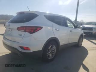 ✅ 2018 Hyundai Santa Fe 2.4L • VIN: 5NMZTDLB4JH077362 • Лот: 41193374. Опубликован ранее на Copart с пробегом Не указан. Бесплатный доступ к архиву аукционных продаж из США и подробный отчёт об истории автомобиля на DreamBid. Изображение 3.