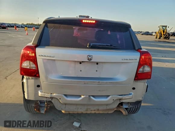 ✅ 2012 Dodge Caliber SXT • VIN: 1C3CDWDA9CD535837 • Лот: 92117905. Опубликован ранее на Copart с пробегом 150 512 миль. Бесплатный доступ к архиву аукционных продаж из США и подробный отчёт об истории автомобиля на DreamBid. Изображение 6.