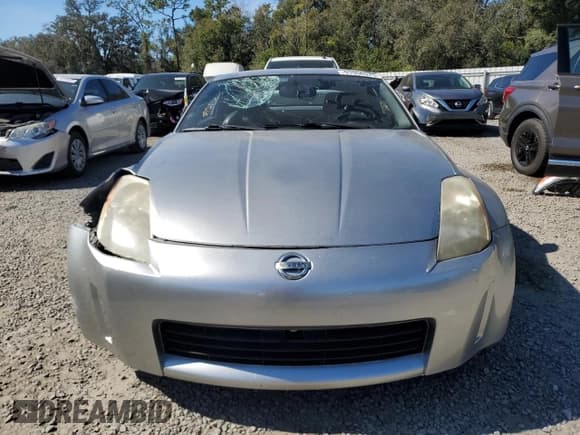 ✅ 2003 Nissan 350Z Touring • VIN: JN1AZ34E33T003854 • Lot: 91956575. Wystawiony na Copart z przebiegiem 91 238 mil. Bezpłatny archiwum sprzedaży aukcyjnych z USA i szczegółowy raport historii pojazdu na DreamBid. Zdjęcie 5.