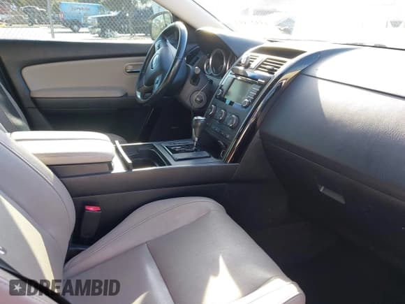 ✅ 2015 Mazda CX-9 Touring • VIN: JM3TB2CA6F0453305 • Lot: 43321813. Listed on IAAI with 174,395 mi. Free auction sales archive from the USA and detailed vehicle history report at DreamBid. Image 5.