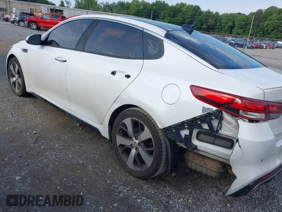 ✅ 2016 Kia Optima SX Turbo • VIN: 5XXGW4L20GG016368 • Lot: 42610152. Listed on IAAI with 165,525 mi. Free auction sales archive from the USA and detailed vehicle history report at DreamBid. Image 14.