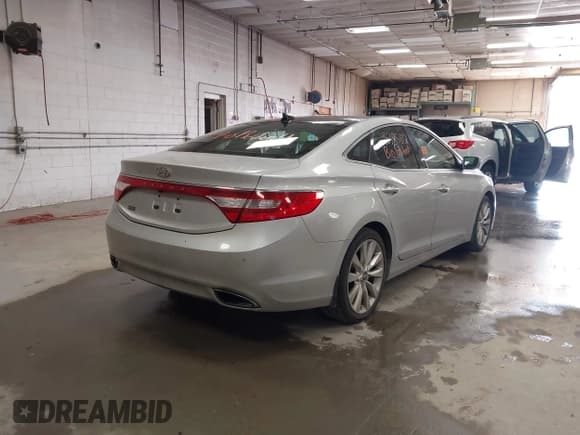 ✅ 2012 Hyundai Azera • VIN: KMHFH4JG1CA153065 • Lot: 43385837. Listed on IAAI with 97,920 mi. Free auction sales archive from the USA and detailed vehicle history report at DreamBid. Image 4.
