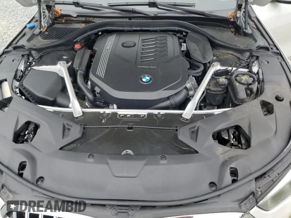 ✅ 2022 BMW 8 Series 840i • VIN: WBAGV4C03NCH43079 • Лот: 59799665. Опубликован ранее на Copart с пробегом 28 069 миль. Бесплатный доступ к архиву аукционных продаж из США и подробный отчёт об истории автомобиля на DreamBid. Изображение 11.