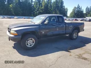 ✅ 2002 Dodge Dakota Sport • VIN: 1B7GG32N72S691779 • Lot: 63165685. Wystawiony na Copart z przebiegiem 165 064 mil. Bezpłatny archiwum sprzedaży aukcyjnych z USA i szczegółowy raport historii pojazdu na DreamBid. Zdjęcie 1.